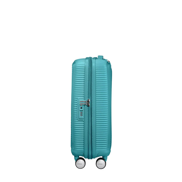 American Tourister Soundbox Spinner 55 Expandable turquoise tonic